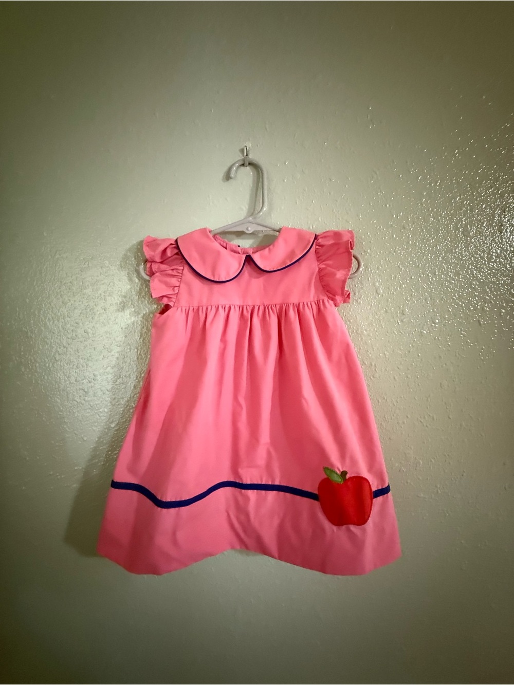 The Beaufort Bonnet Company Pink Dress with Navy Trim and Red Apple